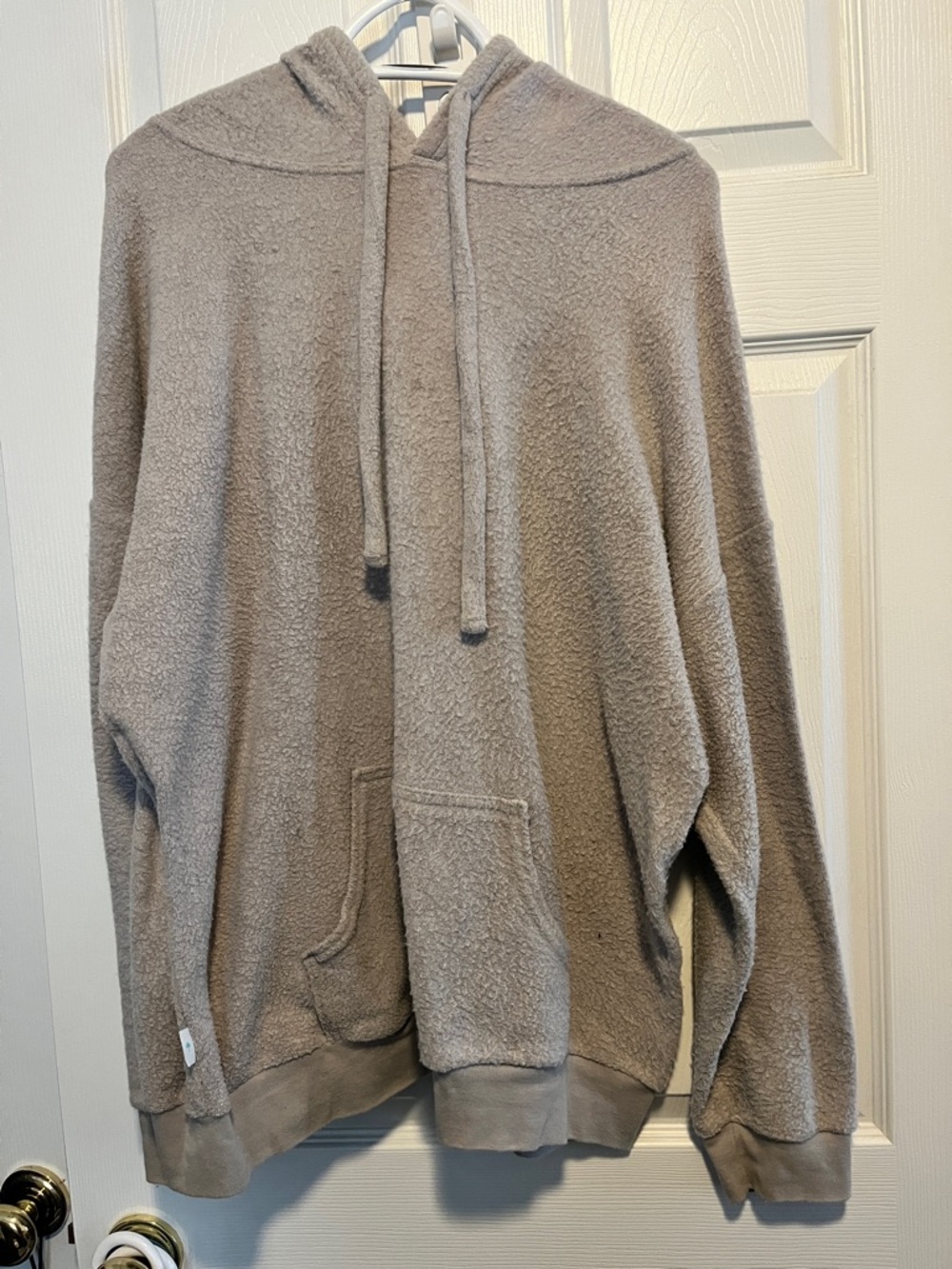 Unisex Hooded Sweatshirt in Oatmeal.